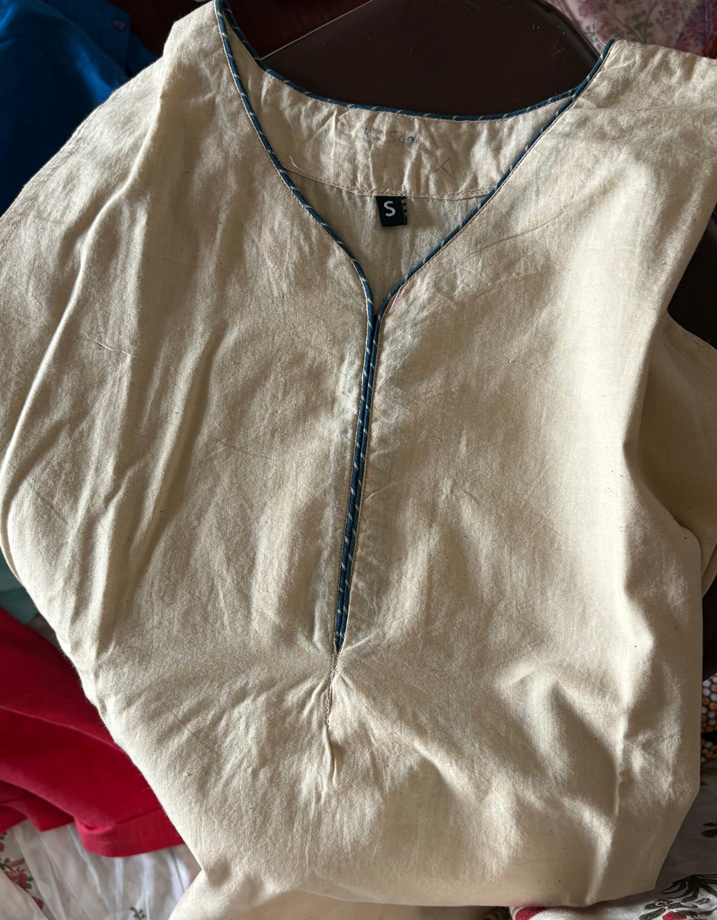 Cotton solid cream sleeveless kurti
