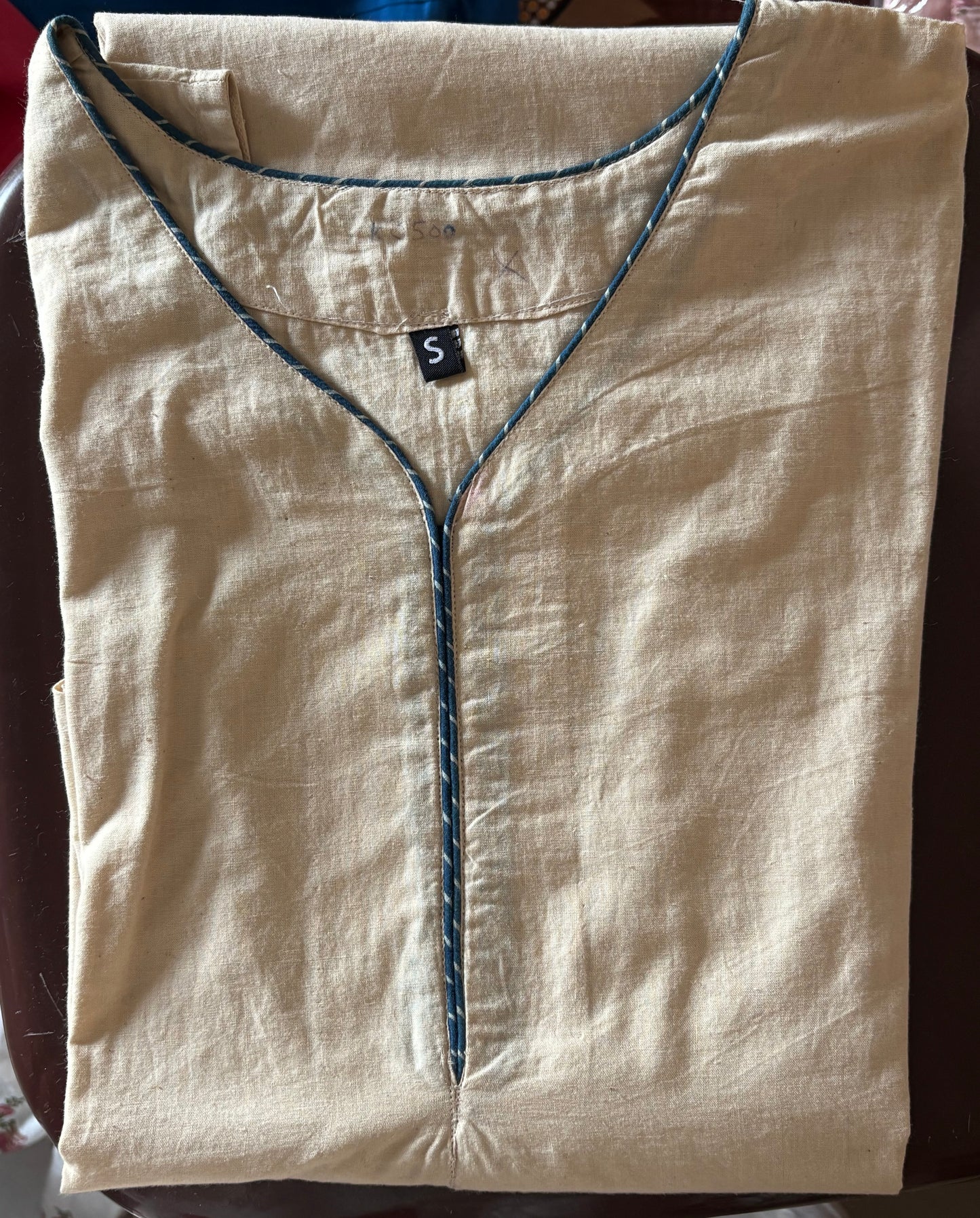 Cotton solid cream sleeveless kurti