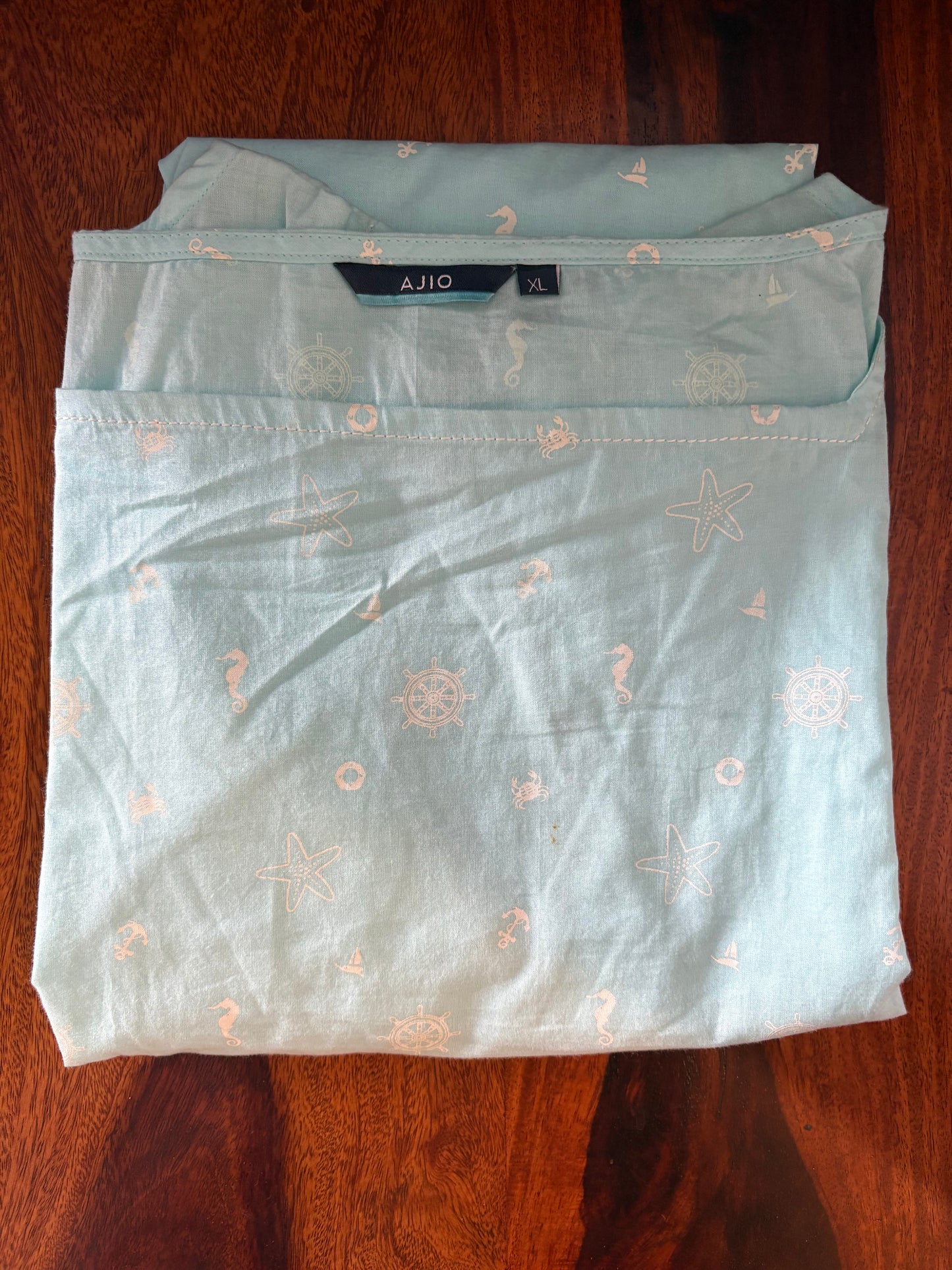 Cotton printed baby blue boat neck kurti